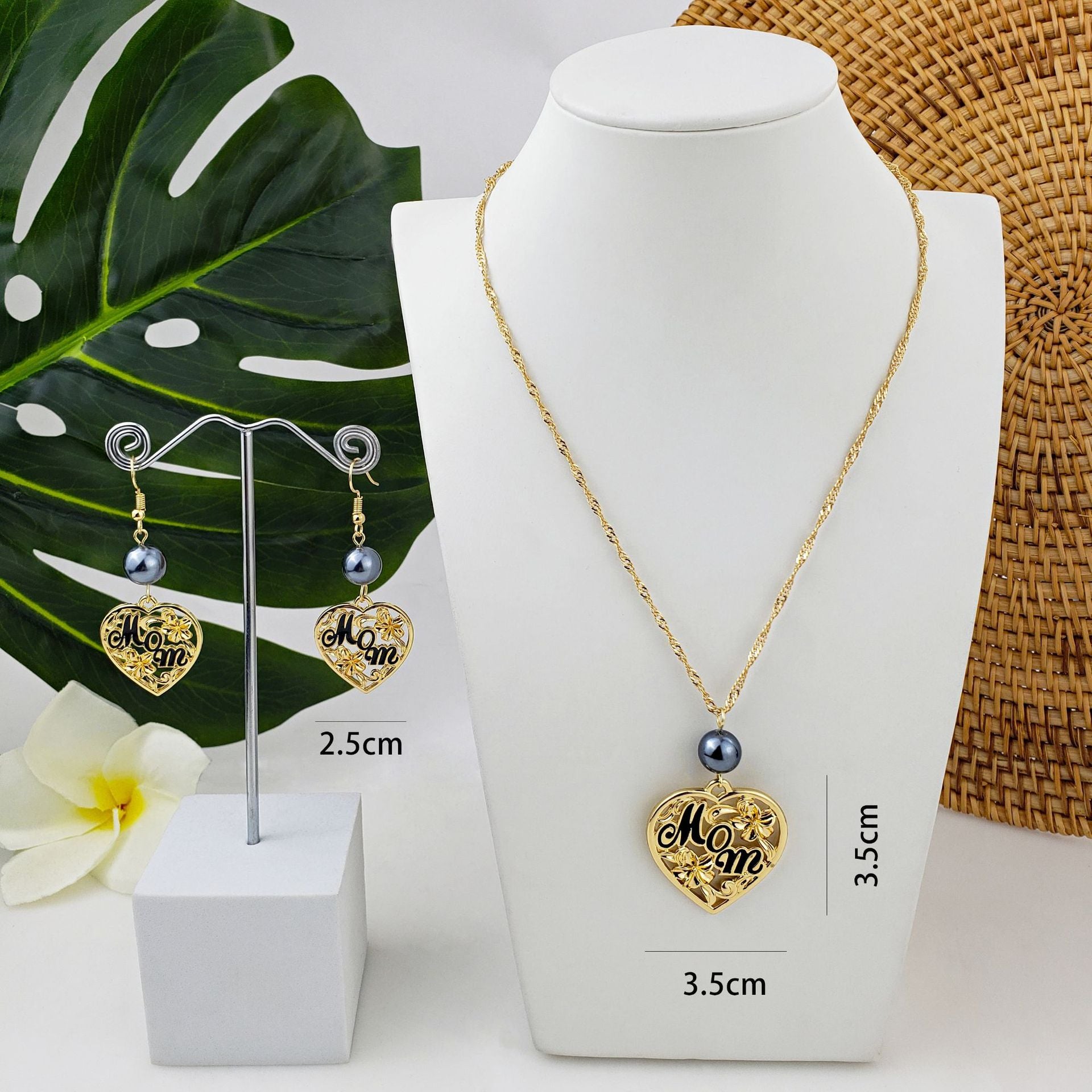 Conjunto de joyería de aretes de aleación hueca de corazón para el día de la madre al por mayor